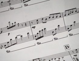 a close up of a sheet of music